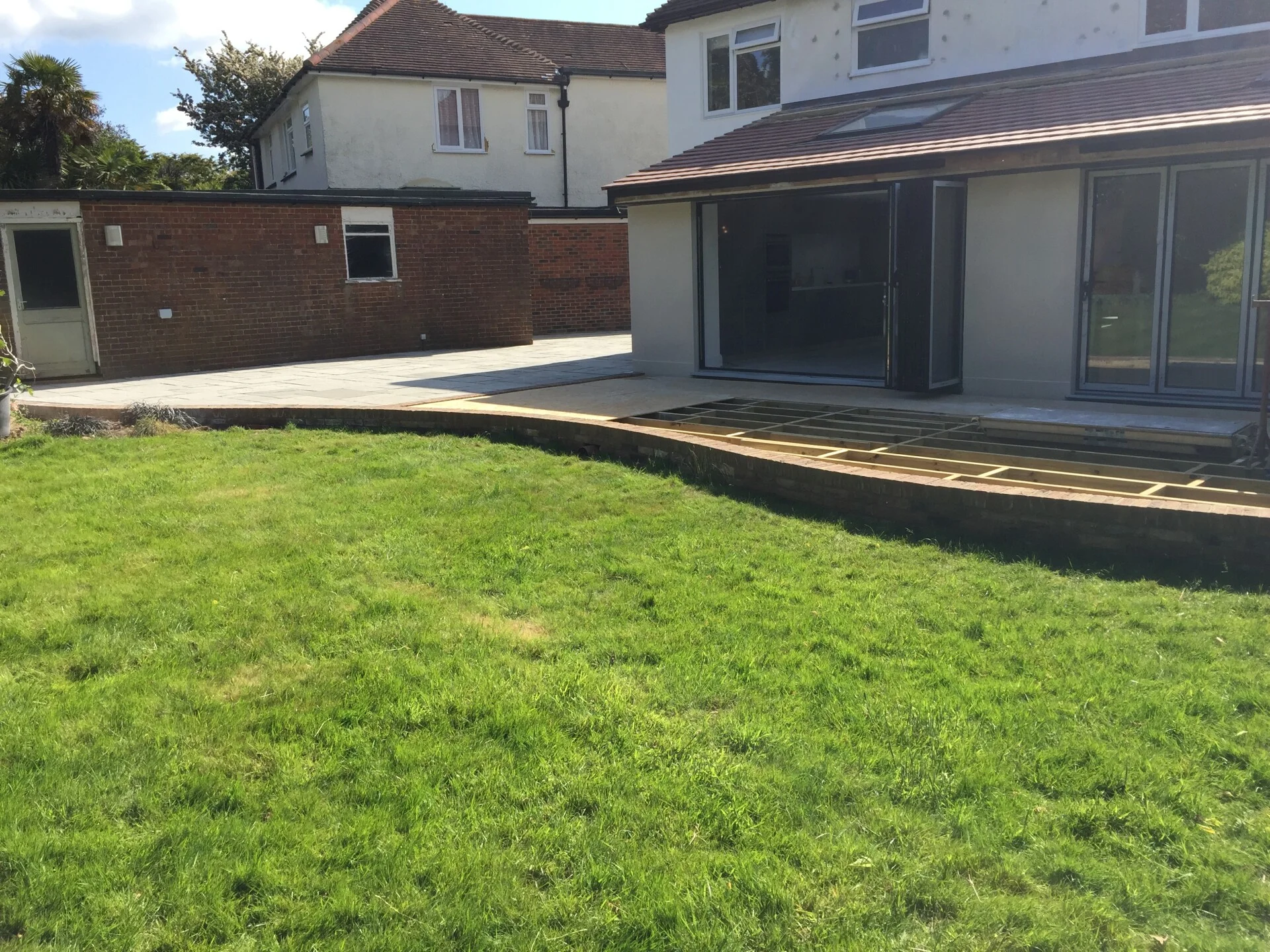 Rear extension with bi-fold doors and flat roof in Brighton