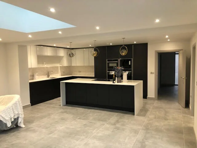 Kitchen diner with skylight flooding the space with natural light
