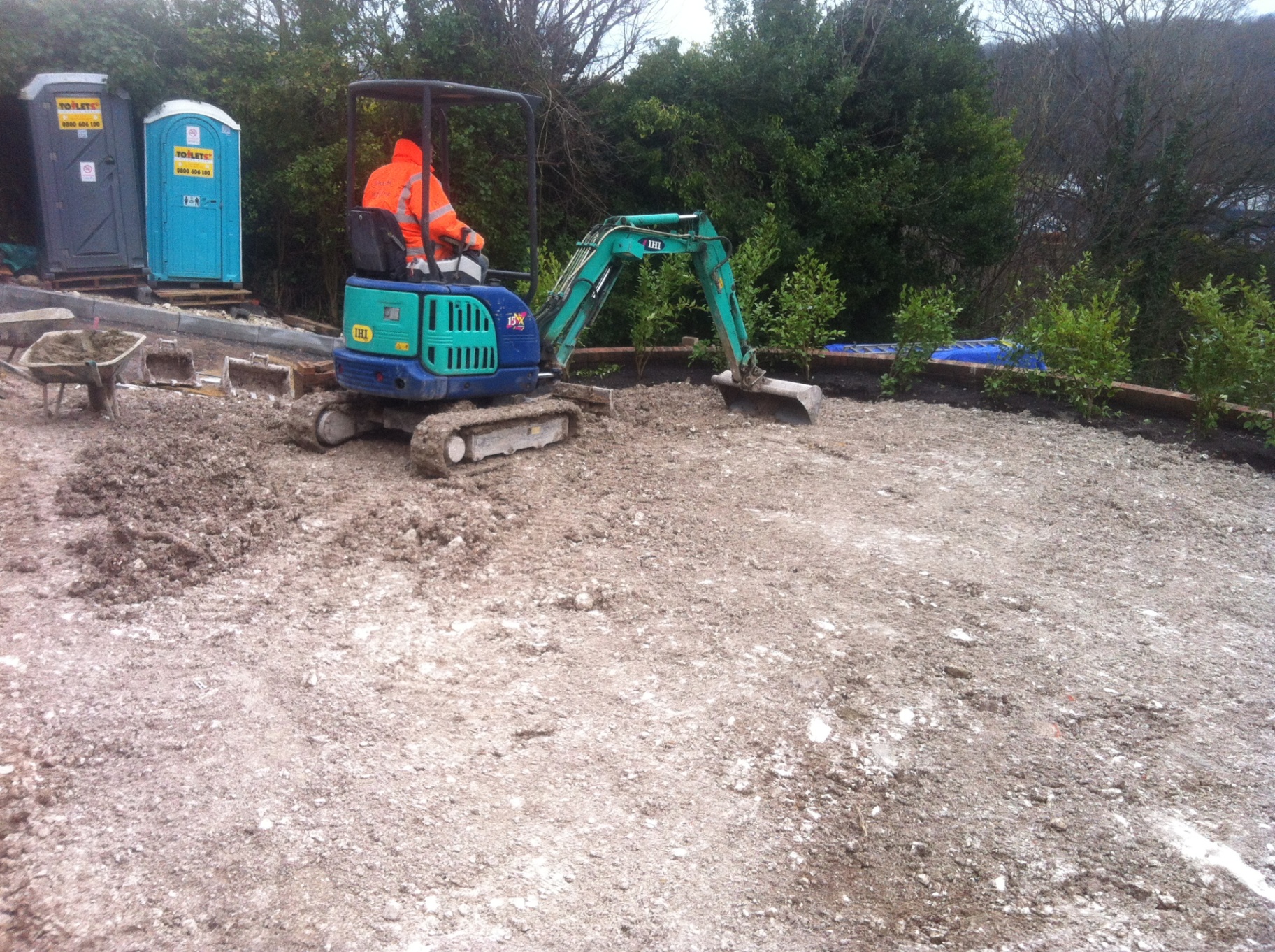 Composite decking terrace with glass balustrade in Brighton garden