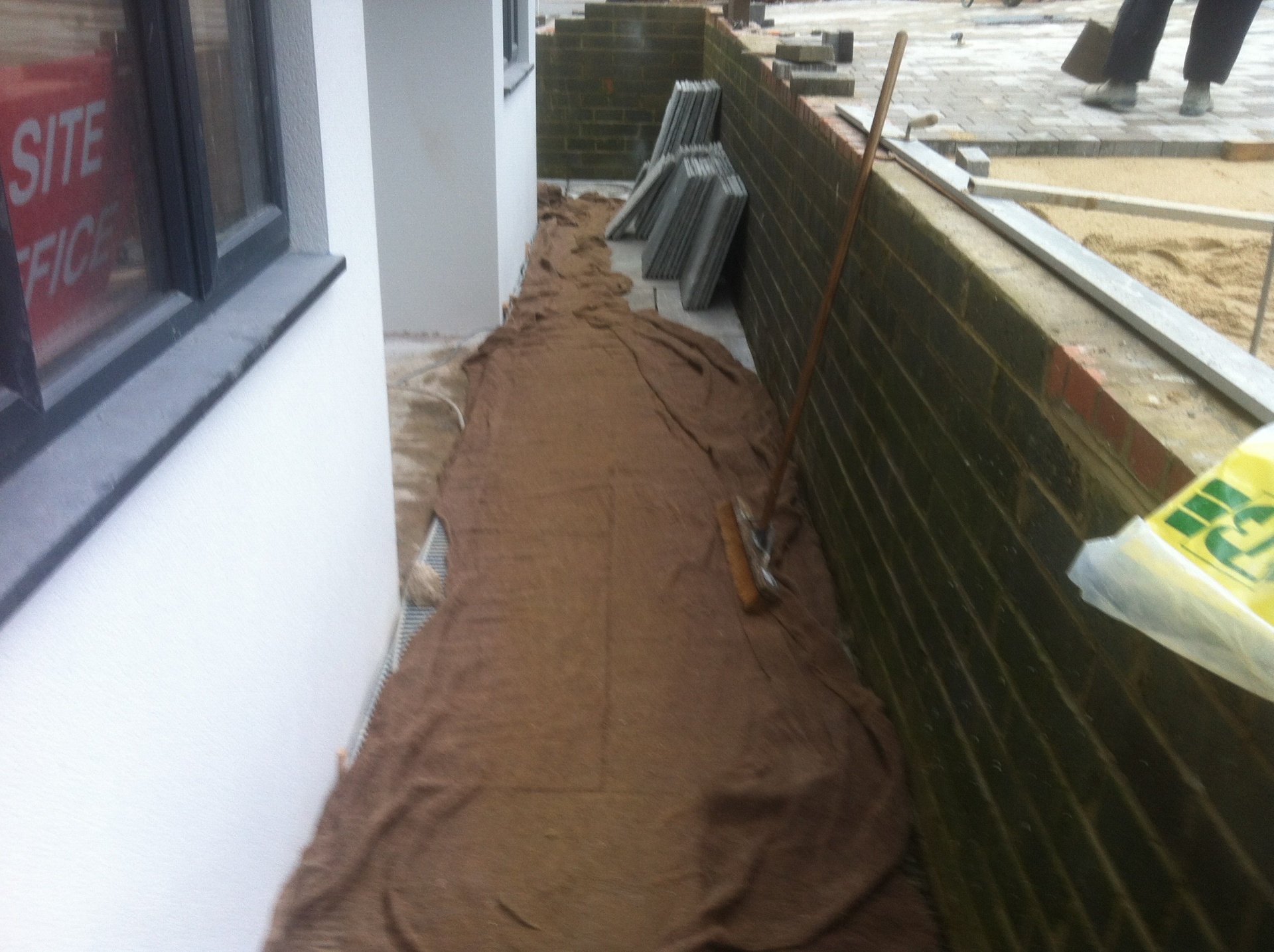 Natural stone patio with step lighting and planting in East Sussex