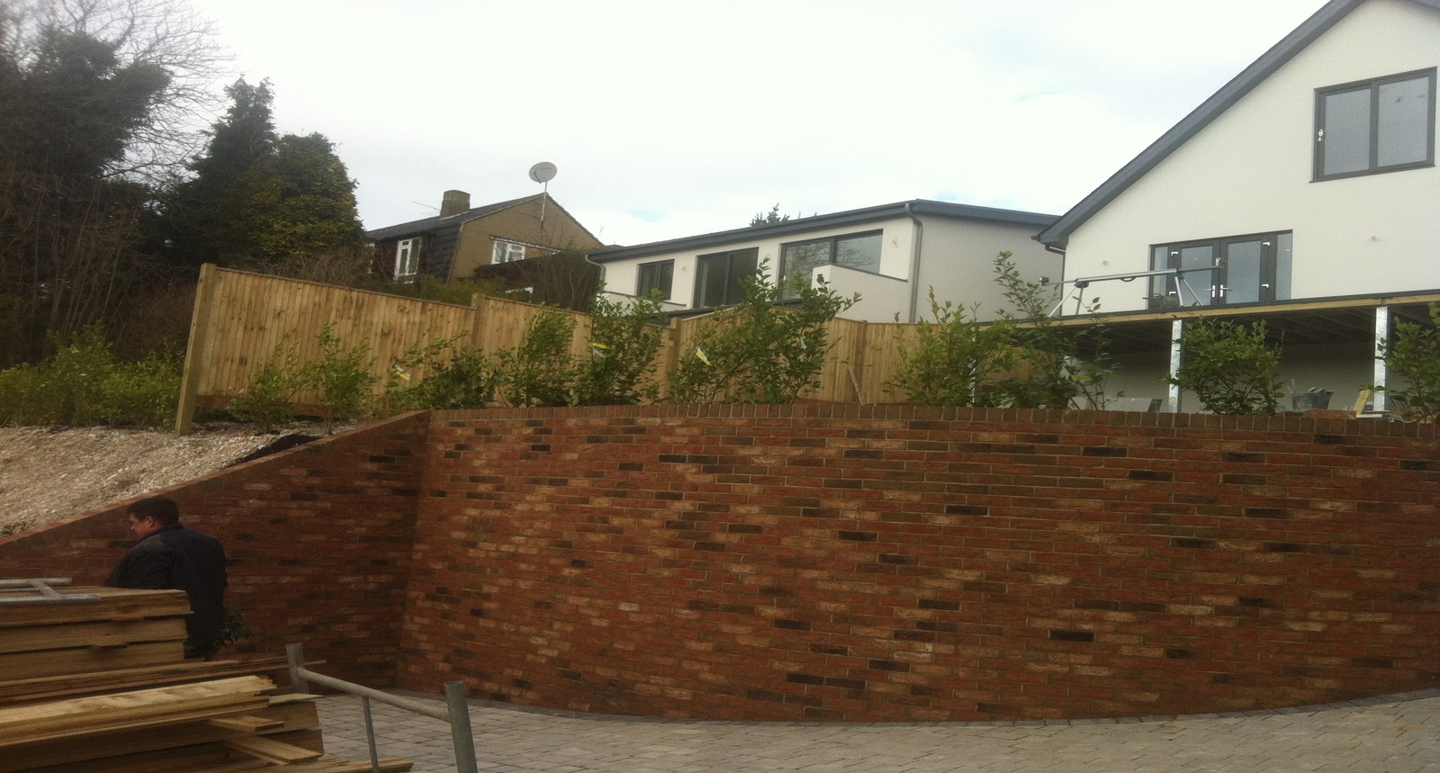 Engineered reinforced concrete retaining wall built by Masters Group in Burgess Hill