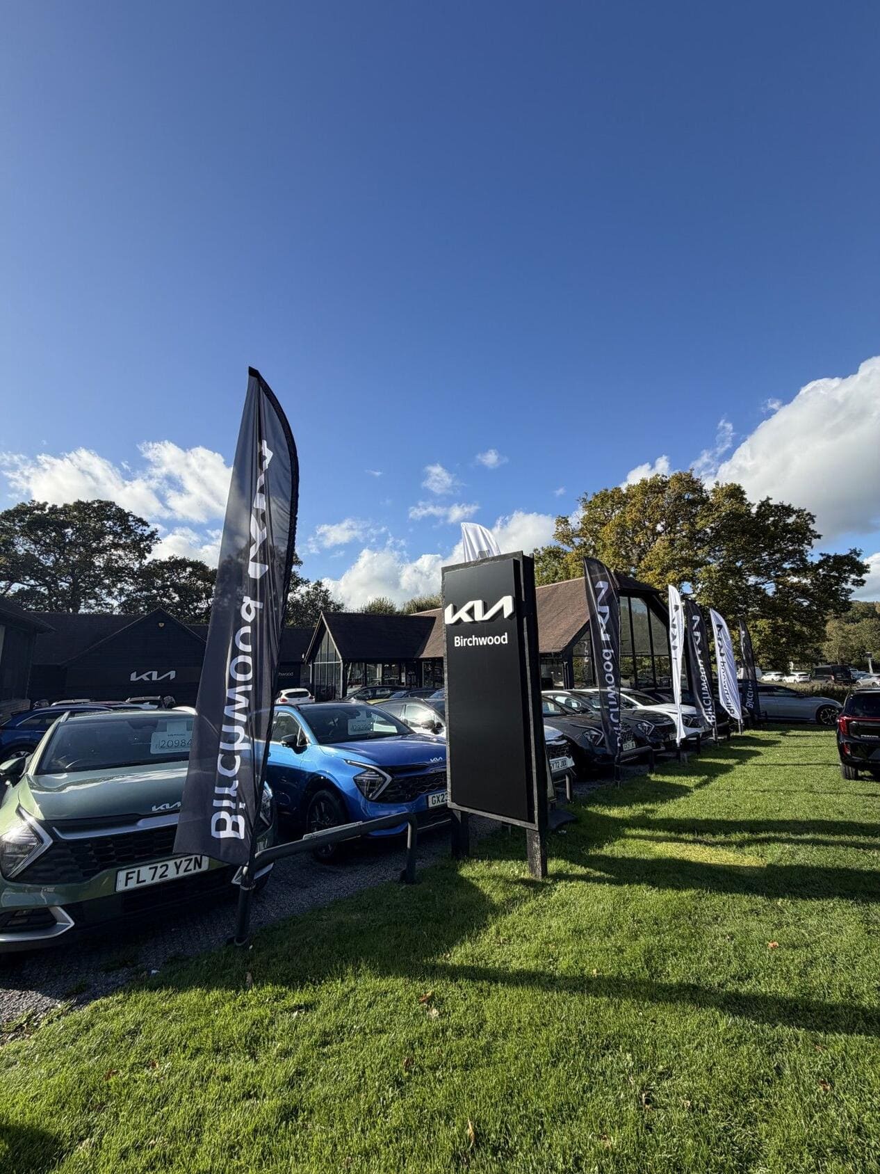 Washington Kia dealership forecourt with vehicles on display